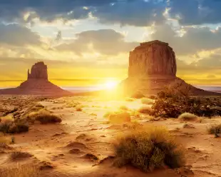 Sunset at the sisters in Monument Valley, USA