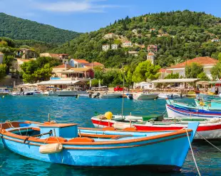 Colourful Greek fishing boats in port of Kioni on Ithaca island, Greece
