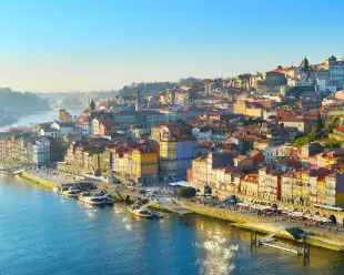 Aerial skyline shot of the colourful buildings in Porto Old Town in sunset light, Portugal.
