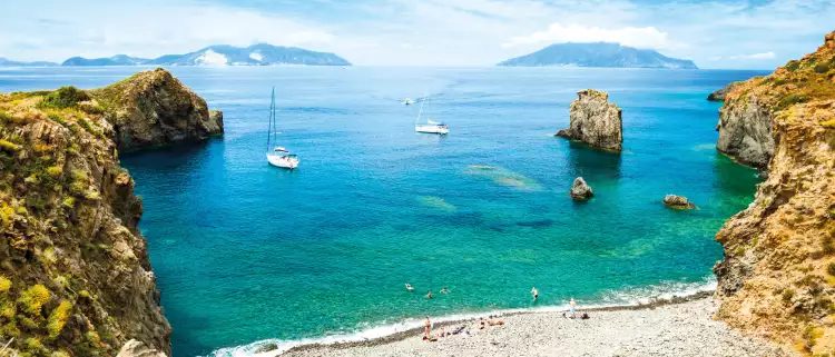 The beautiful turquoise waters of a secluded beach in sicily 