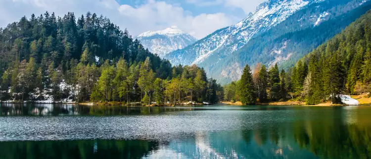 Fantastic views of the tranquil lake with amazing reflection. Mountains & glacier in the background. Peaceful & picturesque landscape. Location: Austria, Europe.