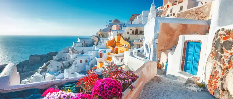 Beautiful view over Santorini white painted houses and the ocean in Greece