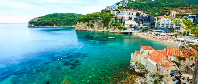 Old Town of Budva with sandy beaches of the Adriatic sea in Montenegro