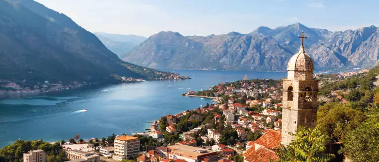 Bay view of the Montenegrin town Kotor and the belltower of Church of Our Lady of Remedy