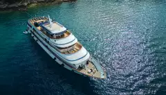 Yacht ship anchored in the crystal blue waters of a croatian bay