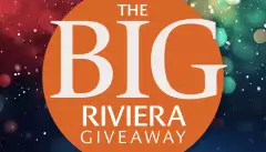 An orange circle with the words The Big Riviera Giveaway on it, with sparkling colours in the background