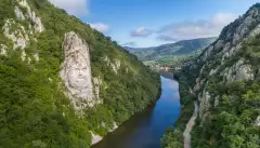 A large rock sculpture of decebalus overlooking the Danube River gorge 