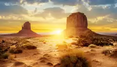 Sunset at the sisters in Monument Valley, USA