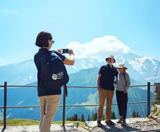 Riviera Tour Manager taking couples photo in Switzerland