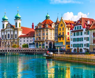 Colourful houses overlook the Reuss River in Lucerne, Switzerland