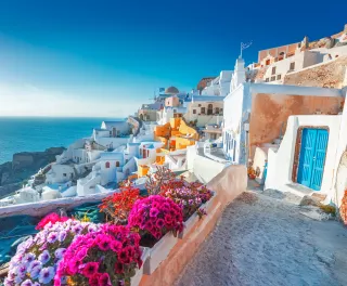 Beautiful view over Santorini white painted houses and the ocean in Greece