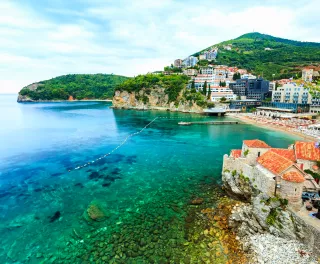 Old Town of Budva with sandy beaches of the Adriatic sea in Montenegro