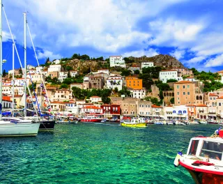 View of port with colourful boats on Hydra island in Saronic, Greece